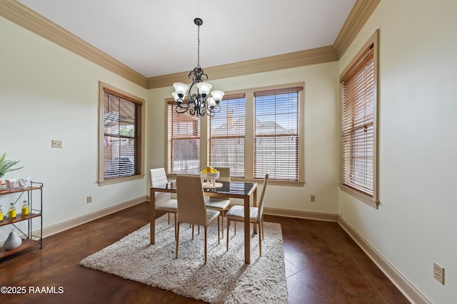 dining area featuring crown molding and a chandelier