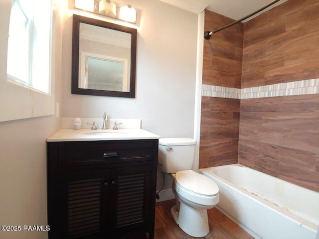 full bathroom with vanity, washtub / shower combination, toilet, and wood finished floors