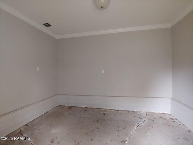 empty room featuring ornamental molding