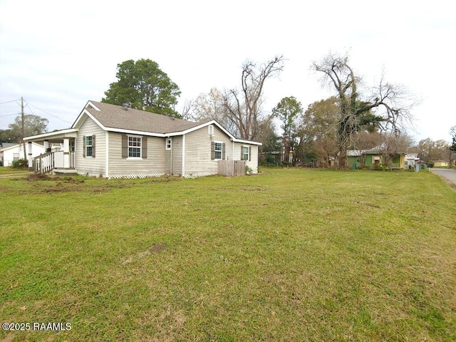 exterior space with a yard