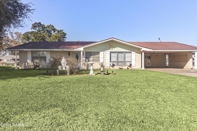 ranch-style home with a front yard and a carport