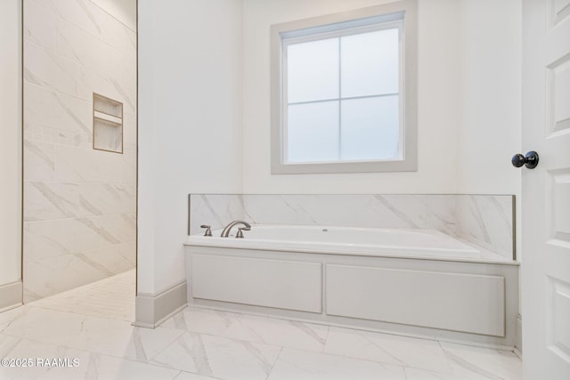 bathroom with plus walk in shower and plenty of natural light