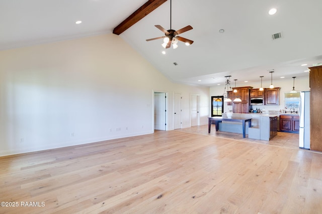 unfurnished living room featuring beam ceiling, ceiling fan, high vaulted ceiling, crown molding, and light hardwood / wood-style floors