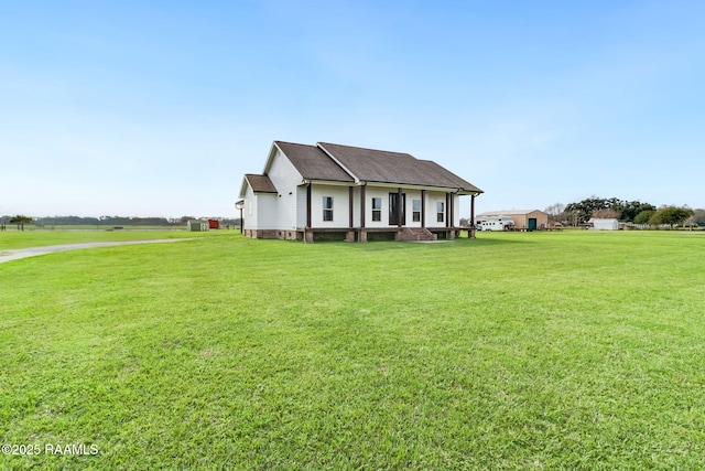 view of front of property with a front lawn