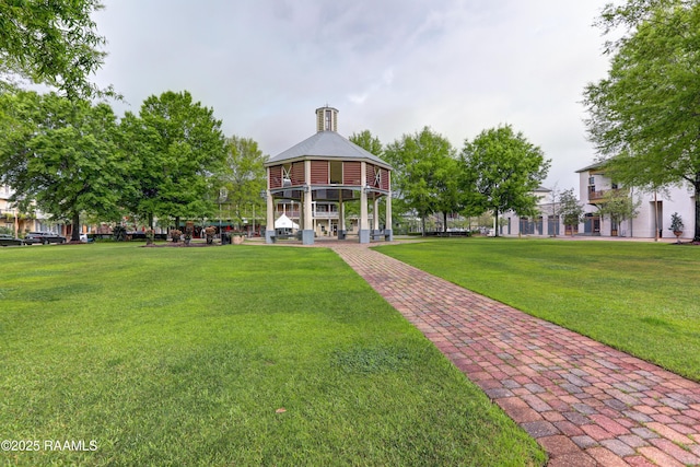 view of community featuring a lawn