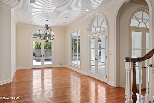 doorway featuring a wealth of natural light, light wood-type flooring, and french doors