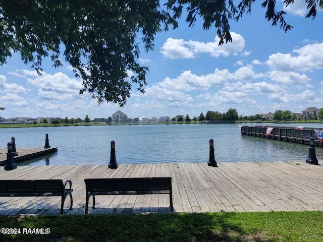 dock area featuring a water view