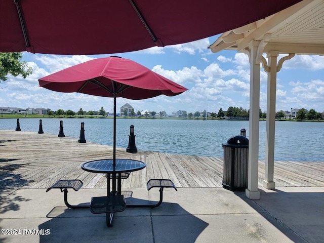 view of dock with a water view