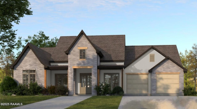 french country style house featuring an attached garage, roof with shingles, concrete driveway, and brick siding