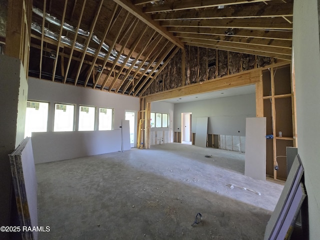 misc room with high vaulted ceiling