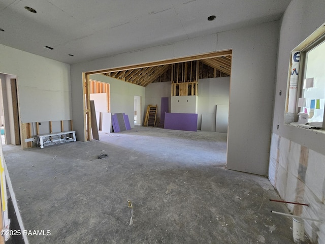 interior space featuring lofted ceiling