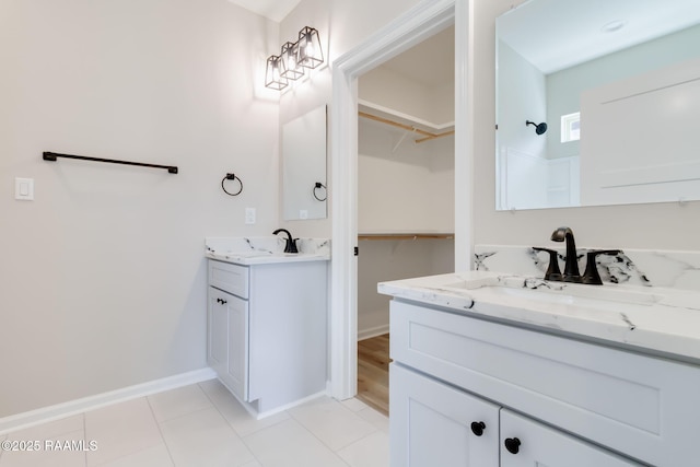 bathroom featuring tile patterned floors and vanity