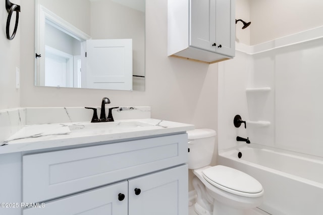 full bathroom featuring shower / tub combination, vanity, and toilet