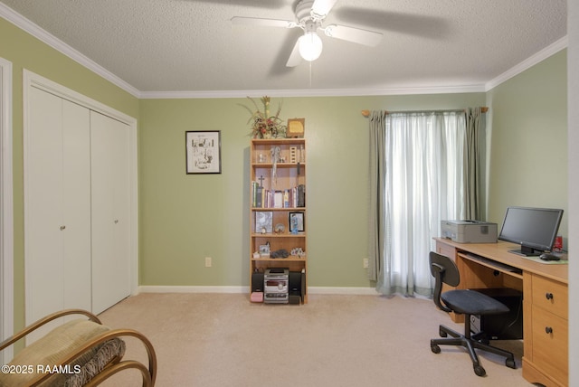 carpeted office space featuring a textured ceiling, ceiling fan, and crown molding