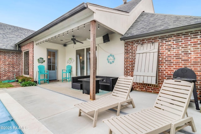 view of patio / terrace featuring ceiling fan