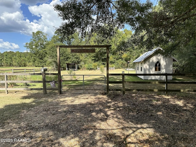 6757 Line Rd, Ethel, LA 70730 - view of yard with a gate and an outdoor structure
