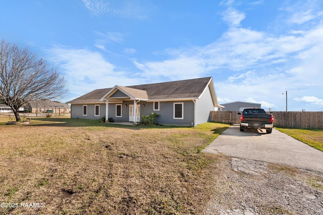 ranch-style house with a front yard