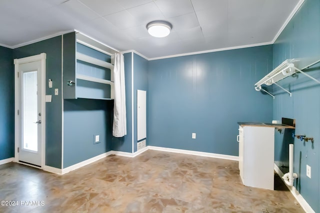 interior space with crown molding