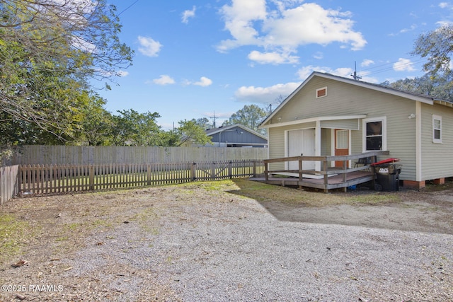 view of front of house with a wooden deck