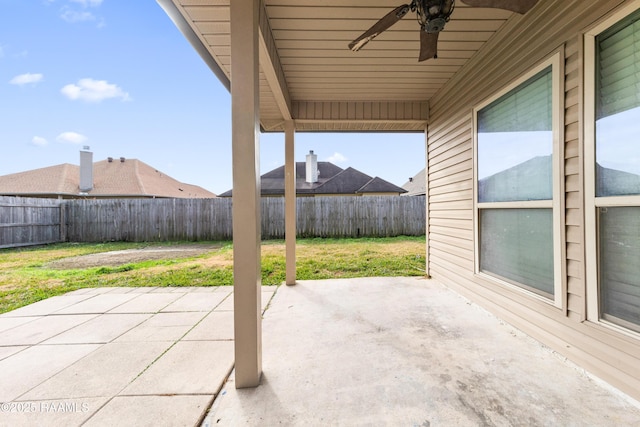 view of patio featuring ceiling fan