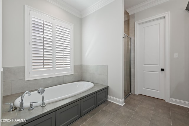 bathroom with crown molding, tile patterned floors, and independent shower and bath