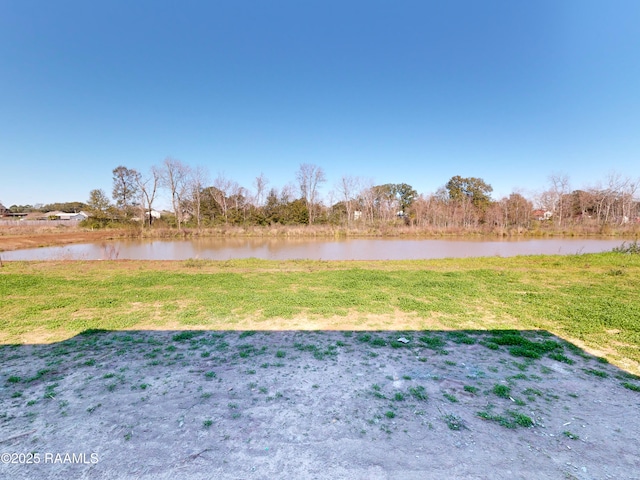 view of yard with a water view