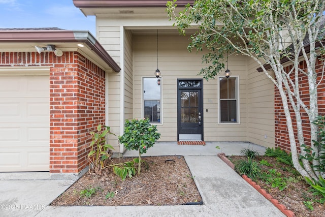 property entrance with a garage