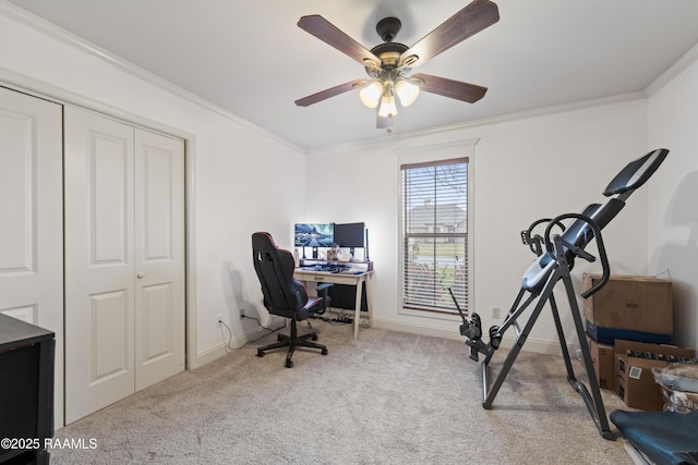 office space with light carpet, ceiling fan, and ornamental molding