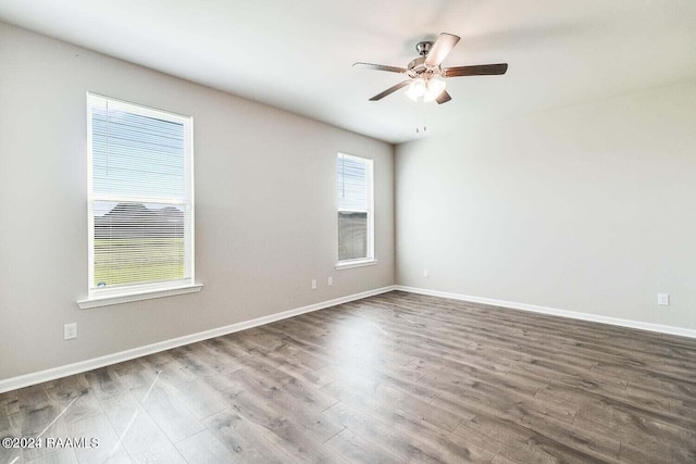 unfurnished room featuring wood-type flooring and ceiling fan