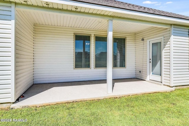 exterior space featuring a yard and a patio