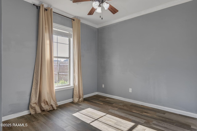 unfurnished room featuring dark hardwood / wood-style flooring, ceiling fan, and crown molding