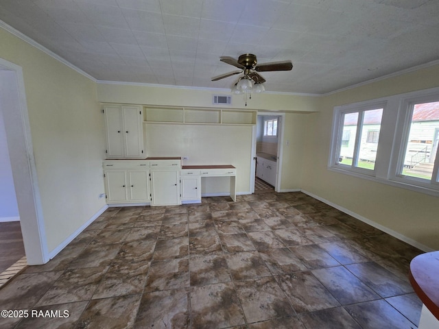 unfurnished bedroom featuring ceiling fan and ornamental molding