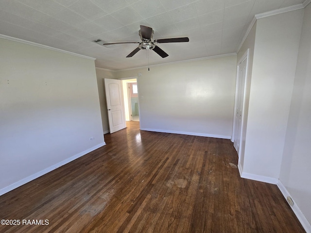 spare room with crown molding, ceiling fan, and dark wood-type flooring