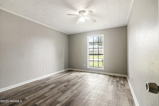 unfurnished room featuring wood-type flooring, ornamental molding, and ceiling fan