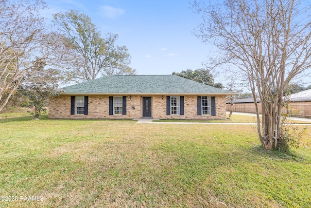 ranch-style home with a front yard