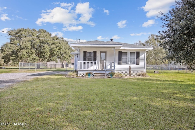 view of front of house featuring a porch and a front yard