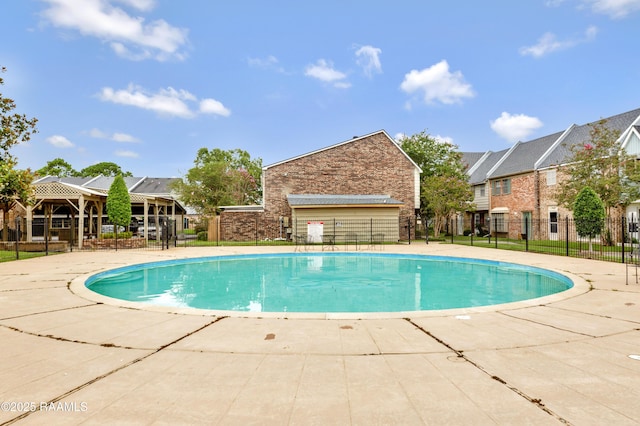 view of pool featuring a patio