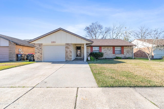 ranch-style home with a front lawn and a garage