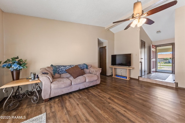 living room with hardwood / wood-style floors, vaulted ceiling with beams, a textured ceiling, and ceiling fan