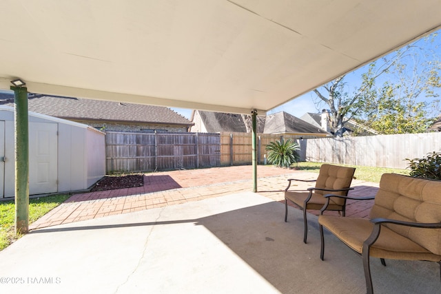 view of patio with a shed