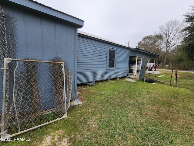 view of property exterior with a lawn