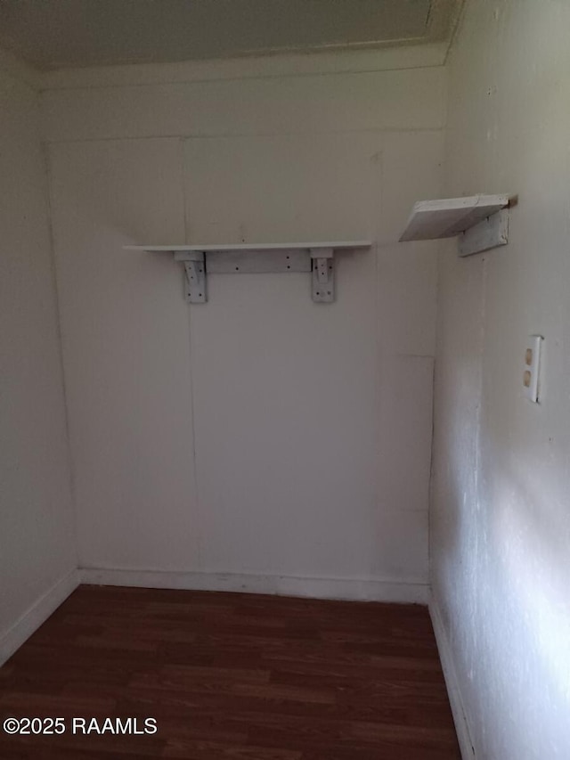 spacious closet with wood finished floors