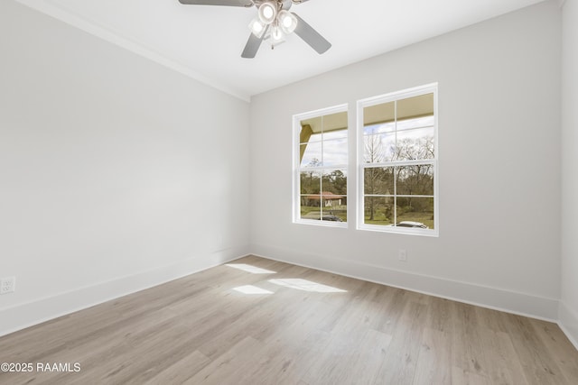 unfurnished room featuring light hardwood / wood-style floors and ceiling fan