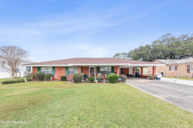 single story home featuring a front yard and a carport