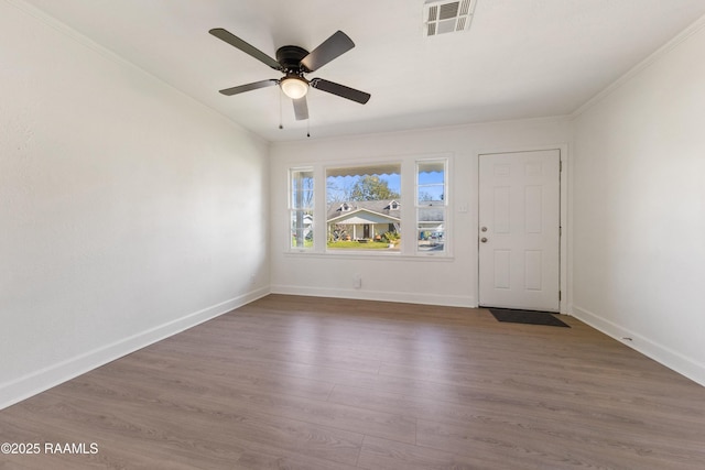 unfurnished room featuring ceiling fan and dark hardwood / wood-style floors