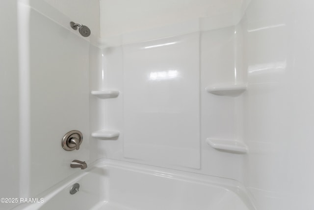 bathroom with shower / bathtub combination