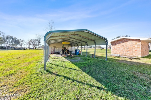 view of vehicle parking featuring a lawn and a carport