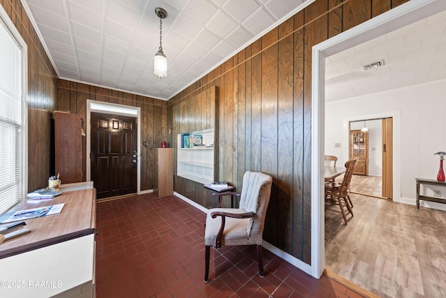 entrance foyer with wood walls