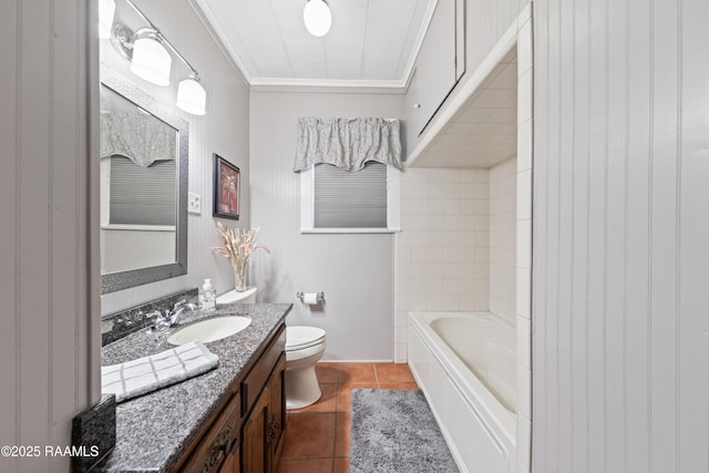 full bathroom featuring shower / bathing tub combination, vanity, toilet, crown molding, and tile patterned floors