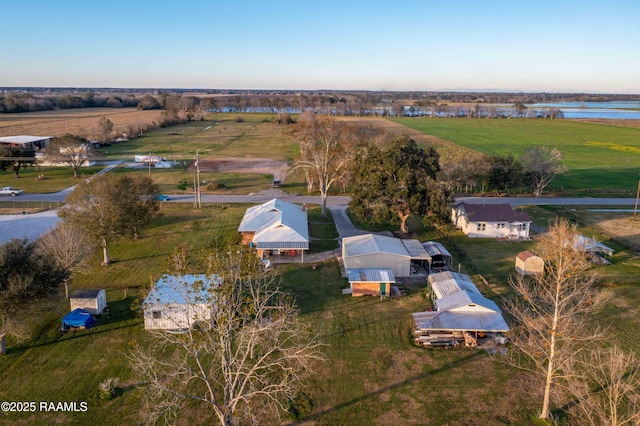 aerial view featuring a rural view and a water view